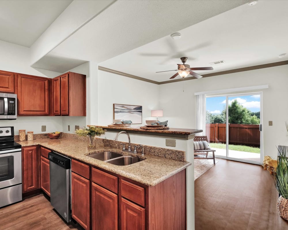 Kitchen with stainless steel appliances at Villas in Westover Hills in San Antonio, Texas