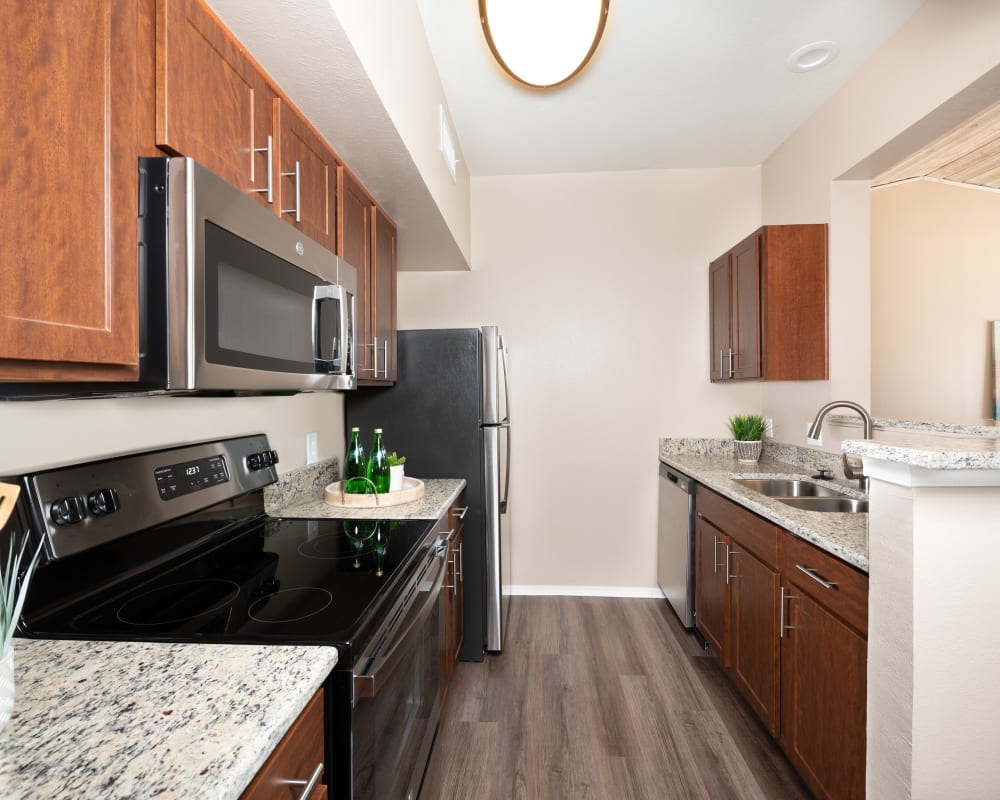 Kitchen with stainless steel appliances at Estates on Frankford 