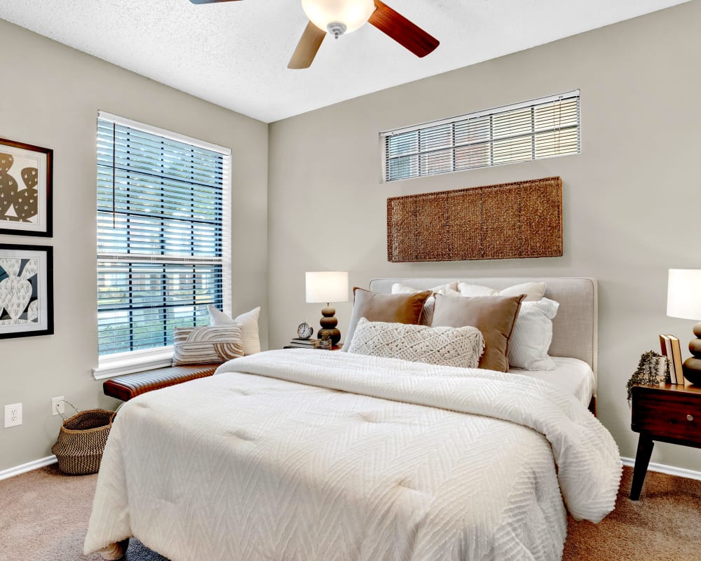 Bedroom with ceiling fan at Carrollton Park of North Dallas 