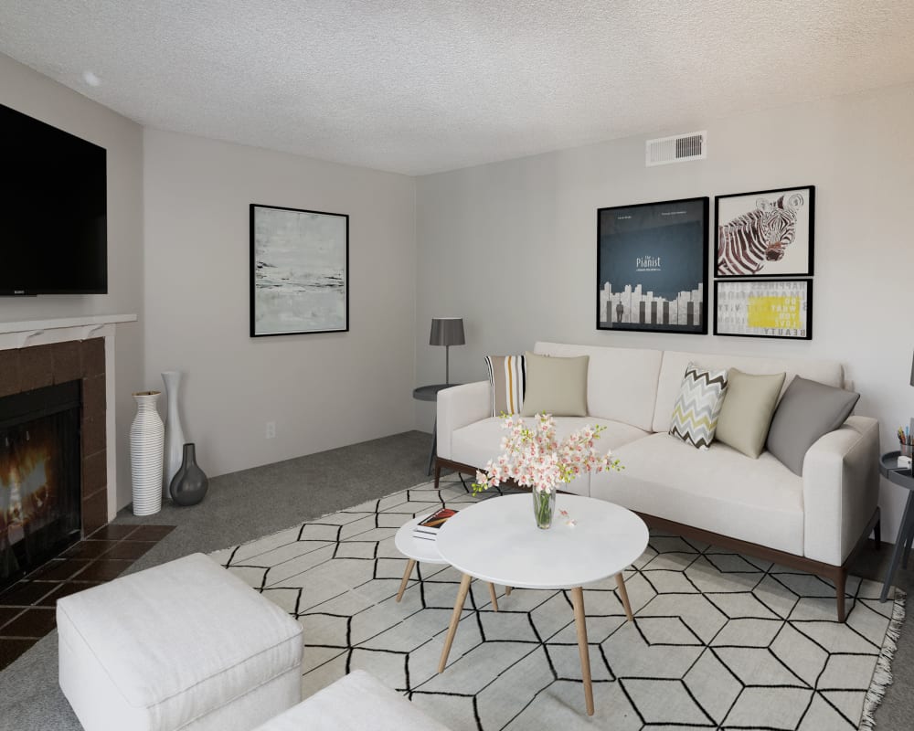 Living room with fireplace at Terra Vida in Carmichael, California