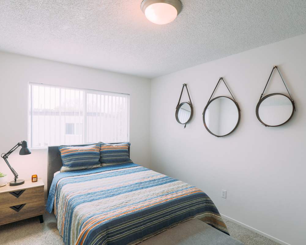 Bedroom with large window at Waterstone Terrace in Benicia, California