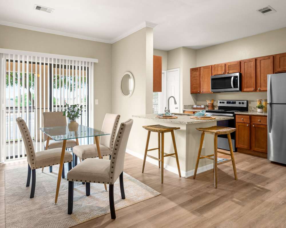 Kitchen with stainless appliances at Villas at Medical Center in San Antonio, Texas