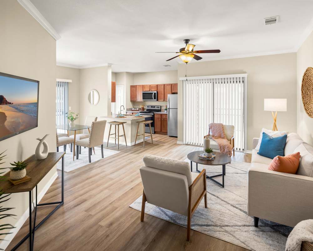 Living room with ceiling fan at Villas at Medical Center in San Antonio, Texas