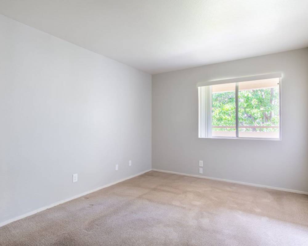 Natural light coming into a bedroom at Somerset Senior Apartments in Antioch, California