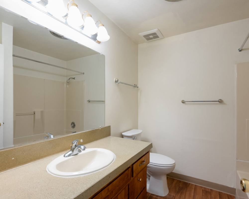 Modern Bathroom with mirror and sink at Park Hill Apartments in Seattle, Washington