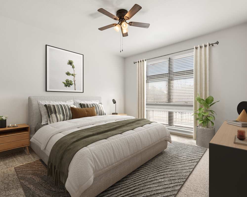 Bright and airy bedroom at Kent Place Residences in Englewood, Colorado