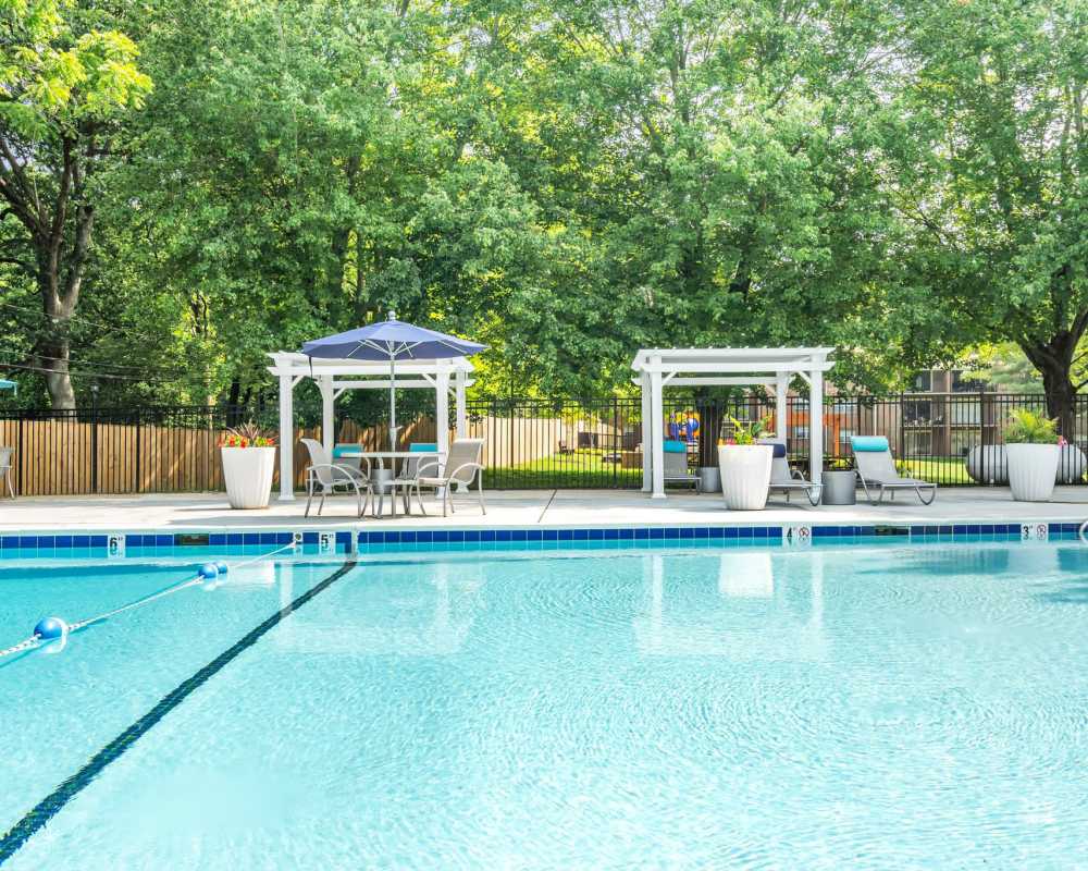 Resident enjoying the pool at Eagle Rock Apartments at Bel Air North in Forest Hill, Maryland