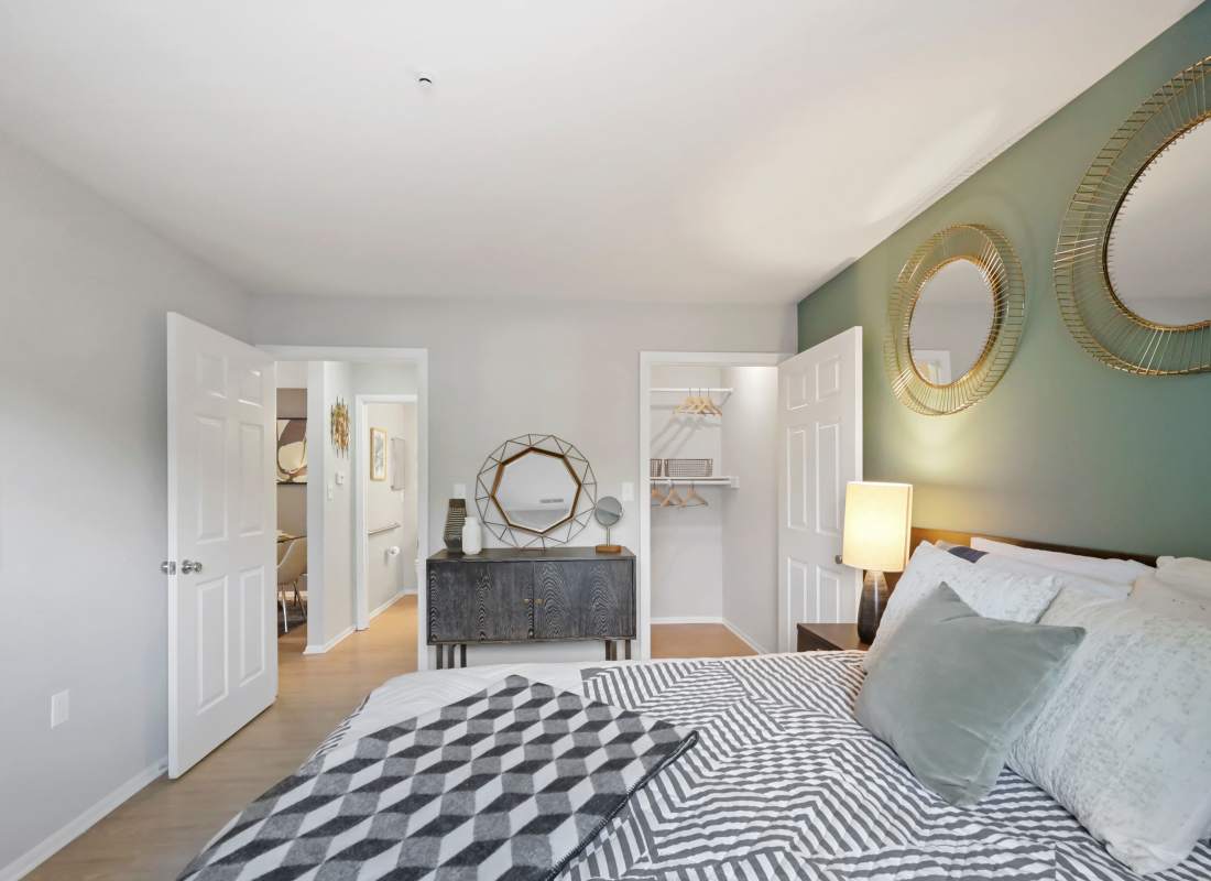 Bedroom with large bathroom and closet at Steeplechase Apartments in Largo, Maryland