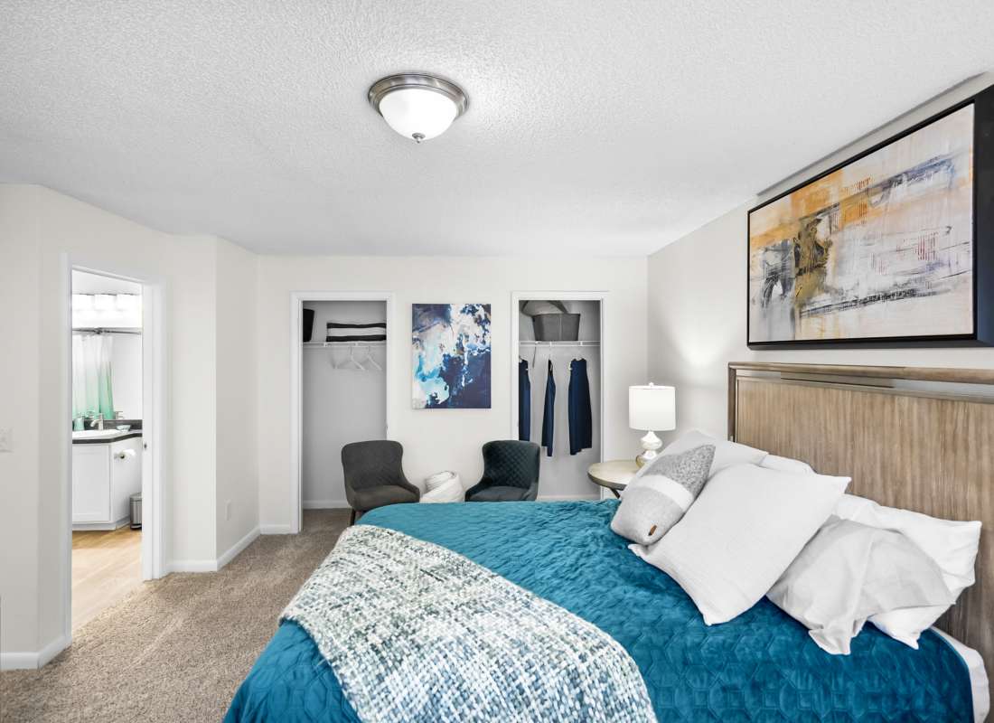 Bedroom with ample closet space at The Isle Apartments in Orlando, Florida