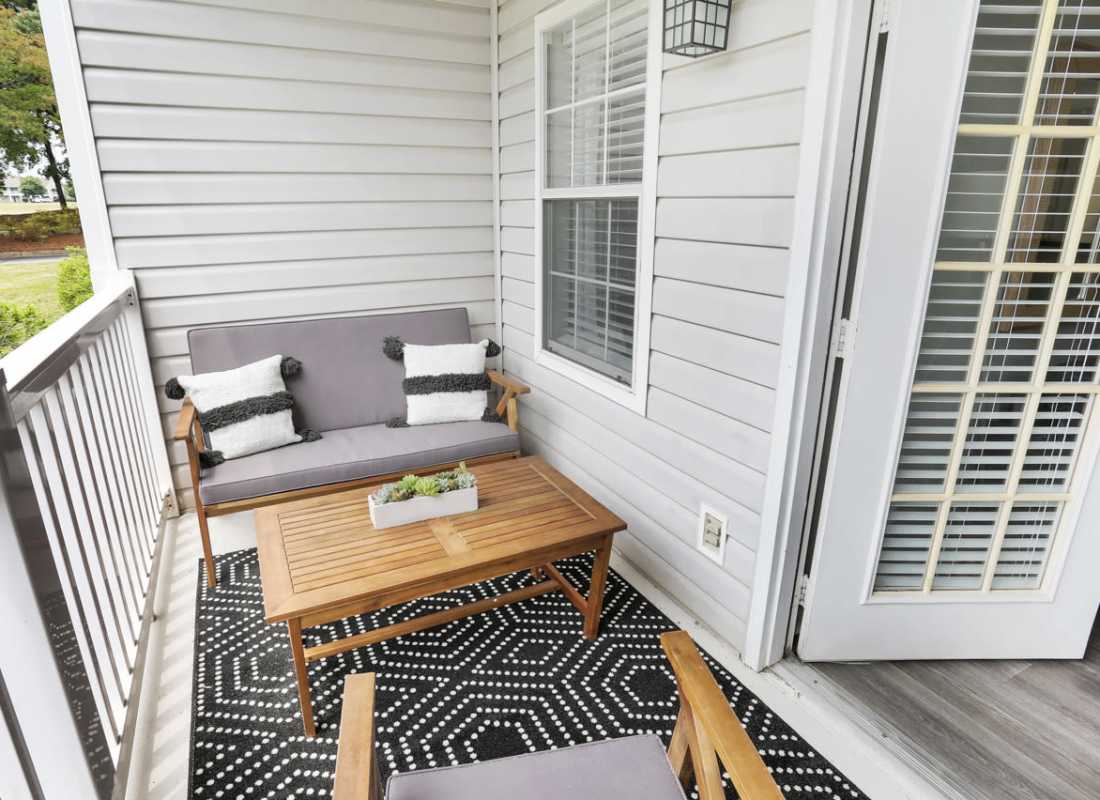 Patio with chairs at The Willows Apartments in Spartanburg, South Carolina