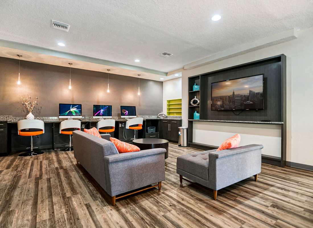 Community lounge with tv at Park Avenue in Jacksonville, Florida