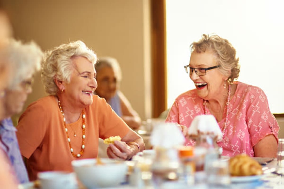 Residents enjoying dining services at The Village at Silver Sage in Haltom City, Texas