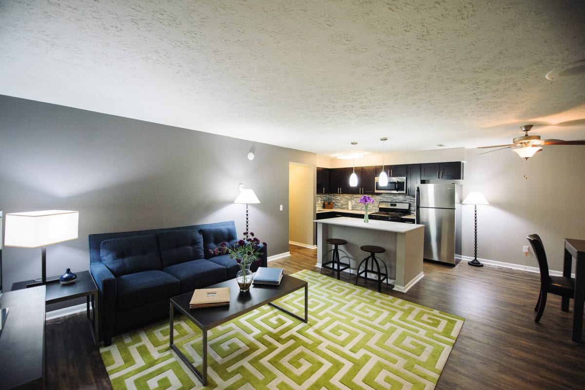 Spacious living room and kitchen at Fox and Hounds Apartments in Columbus, Ohio