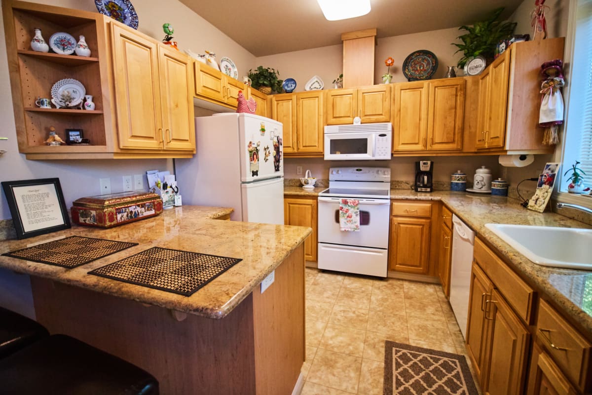 Senior apartment kitchen in a home at Pioneer Village in Jacksonville, Oregon