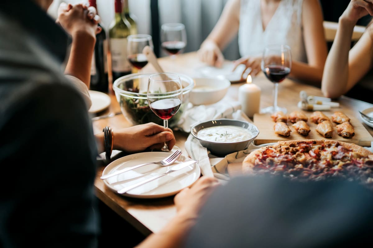 Residents drink wine and eating pizza near Optimist Lofts in Atlanta, Georgia