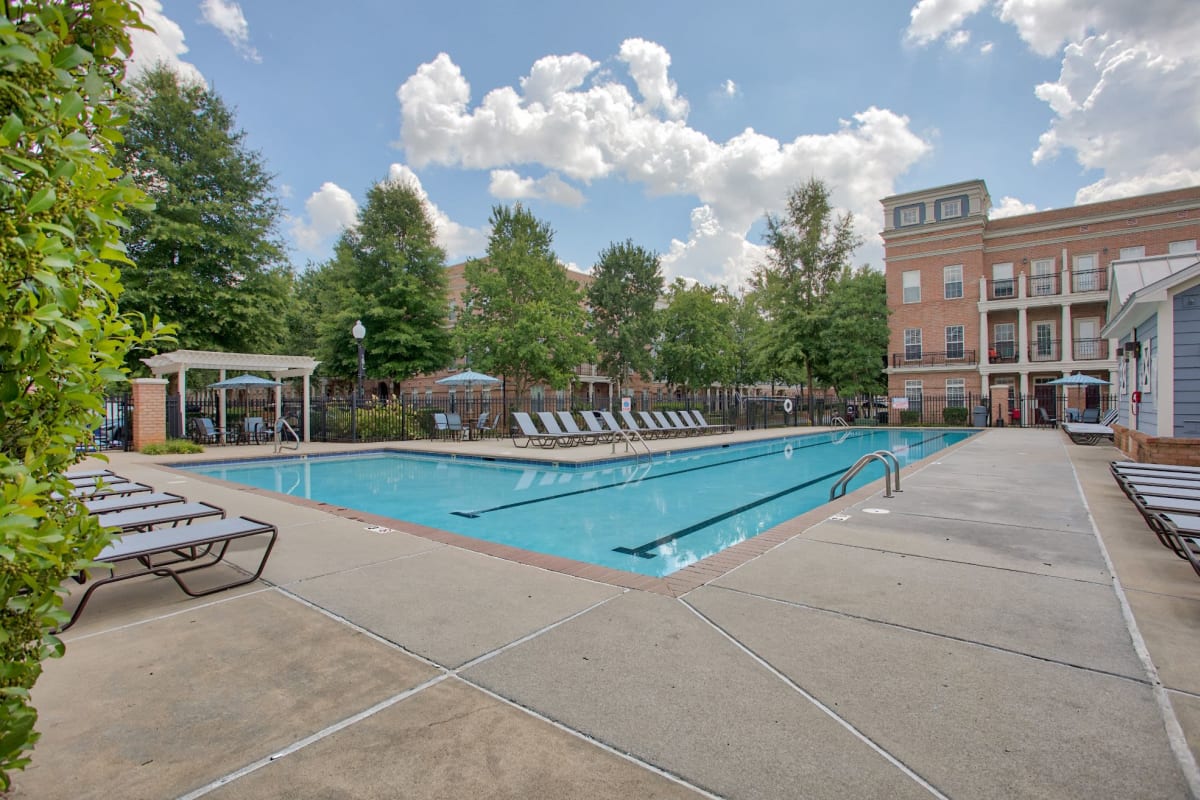 In Charlotte, North Carolina at the pool with ample seating for residents at Worthington Apartments & Townhomes