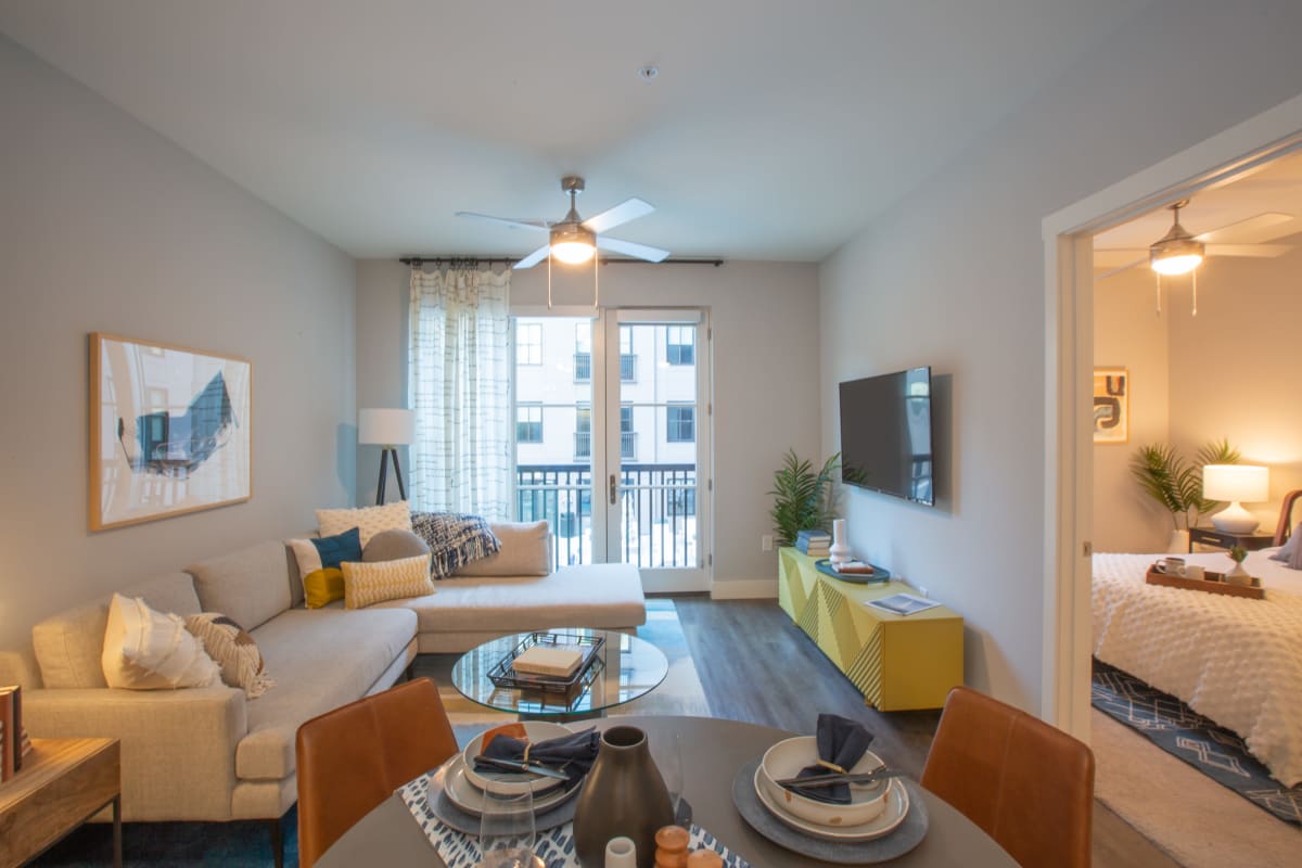 Bright living room with patio access at 511 Meeting in Charleston, South Carolina