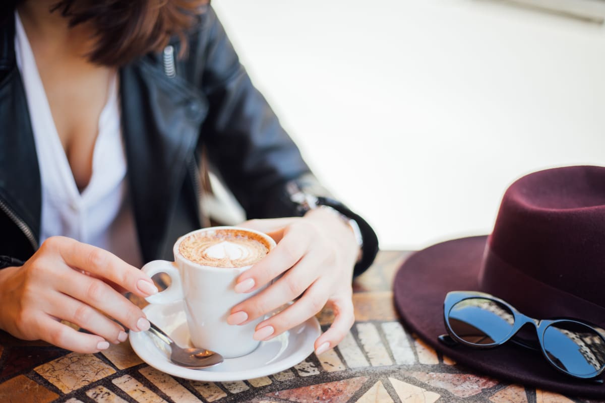 Resident enjoying a latte near Autumn Ridge in Waukee, Iowa