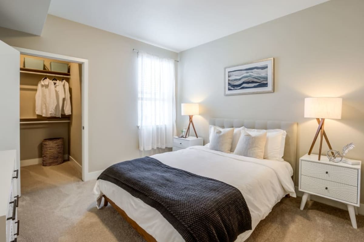 Bedroom with walk-in closet at The Wyatt Apartments in Fort Collins, Colorado