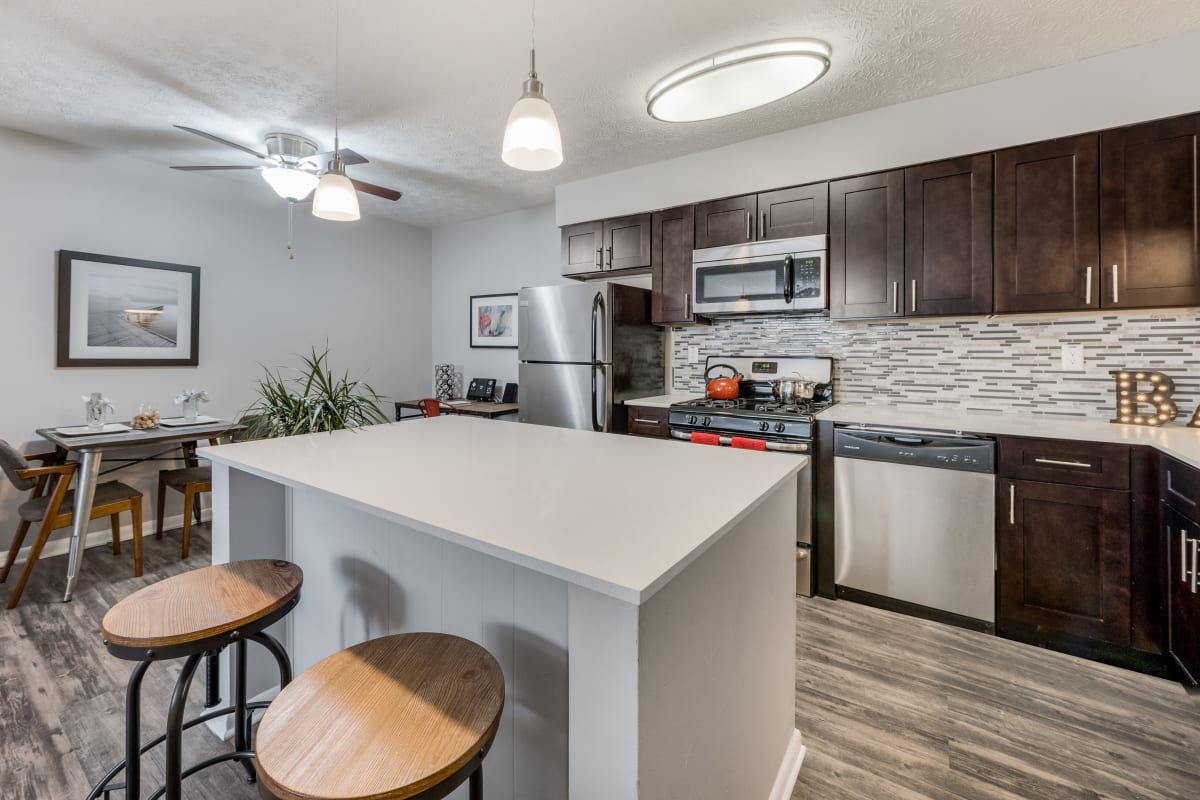 Spacious living room and kitchen at Fox and Hounds Apartments in Columbus, Ohio