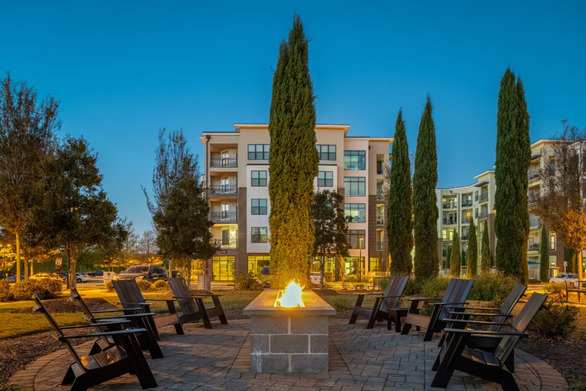 Outdoor fire pit with surrounding chairs at Marq at Crabtree in Raleigh, North Carolina