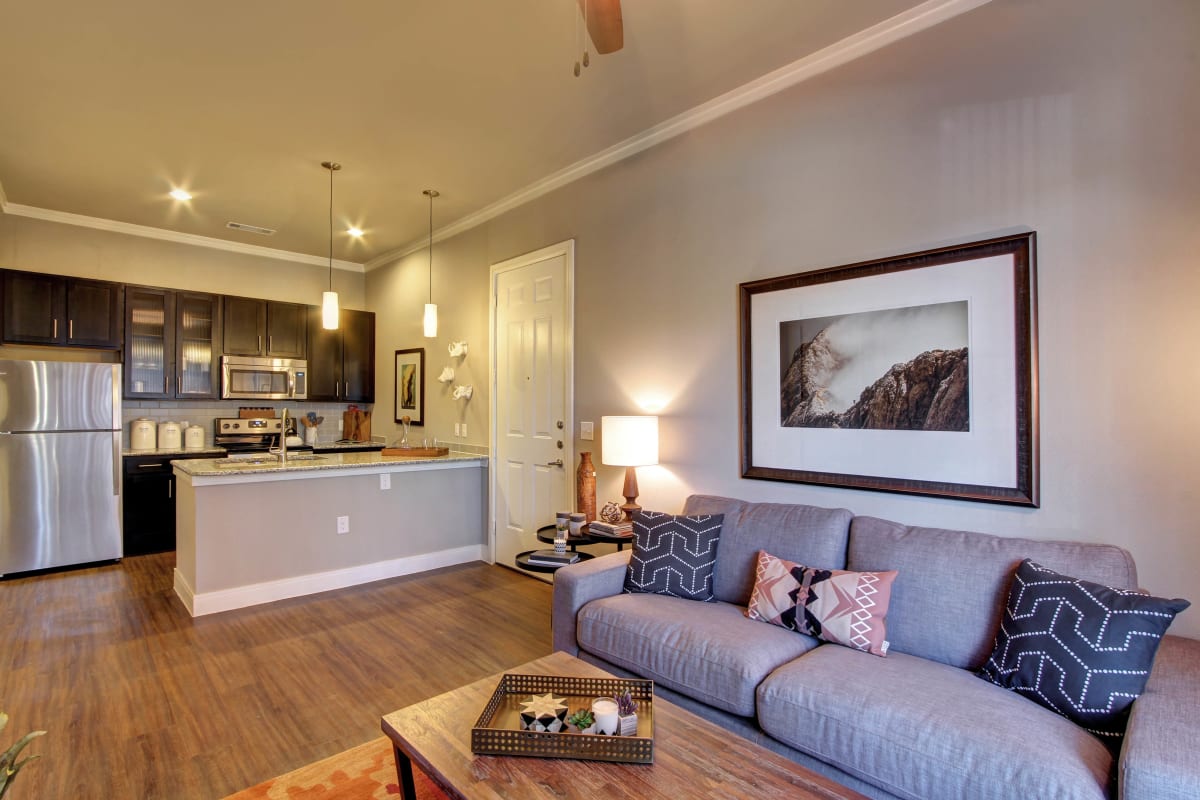 Open floor plan with wood flooring at Marquis at Barton Trails in Austin, Texas