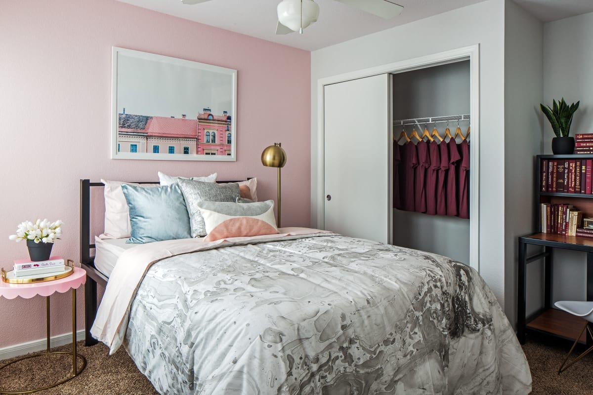 Model bedroom with a large closet at The Kristi in Corpus Christi, Texas