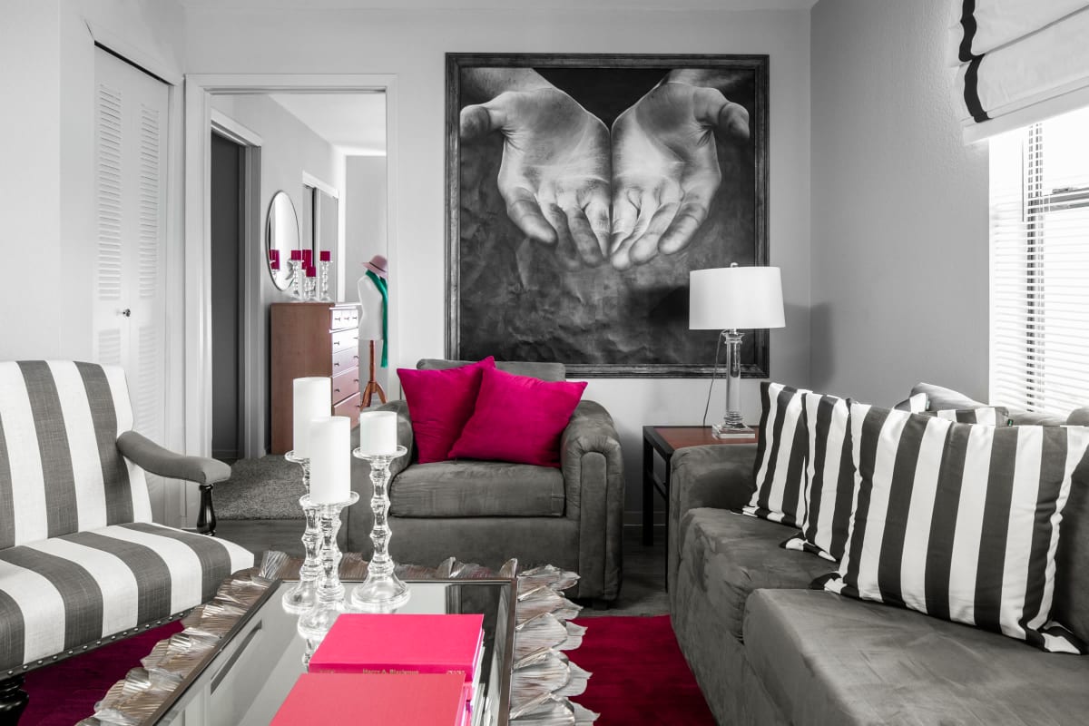 Stylishly decorated living room in a model student apartment at The London in College Station, Texas