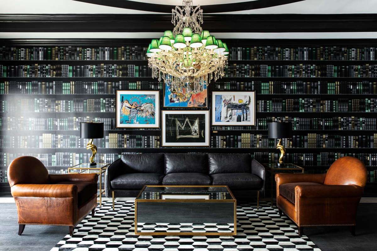 Leather couch and armchairs in the stunning library space at University Village in Greensboro, North Carolina