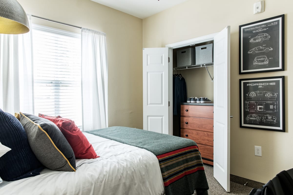 Bedroom with a large closet at University Village in Greensboro, North Carolina