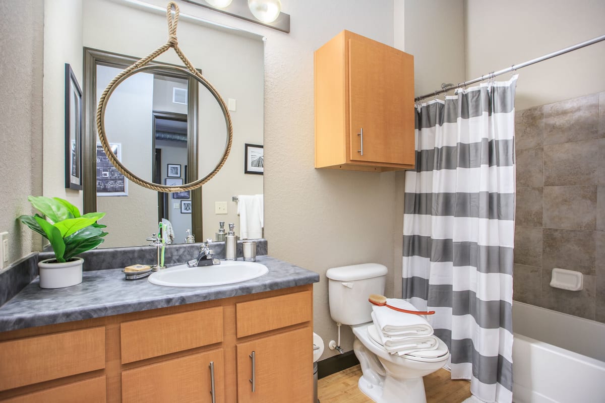 Bathroom with a tub/shower combination at 4050 Lofts in Tampa, Florida