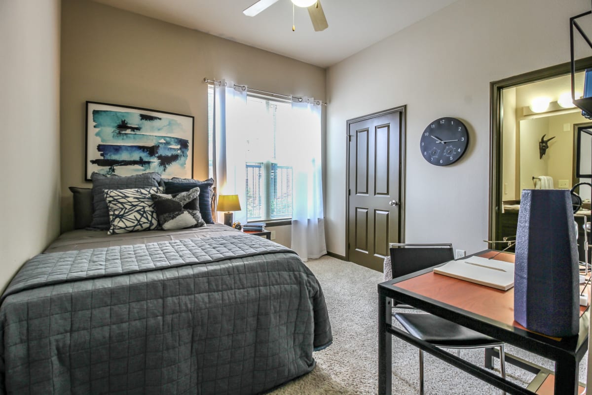 Model bedroom with great natural light at Crimson in Tuscaloosa, Alabama