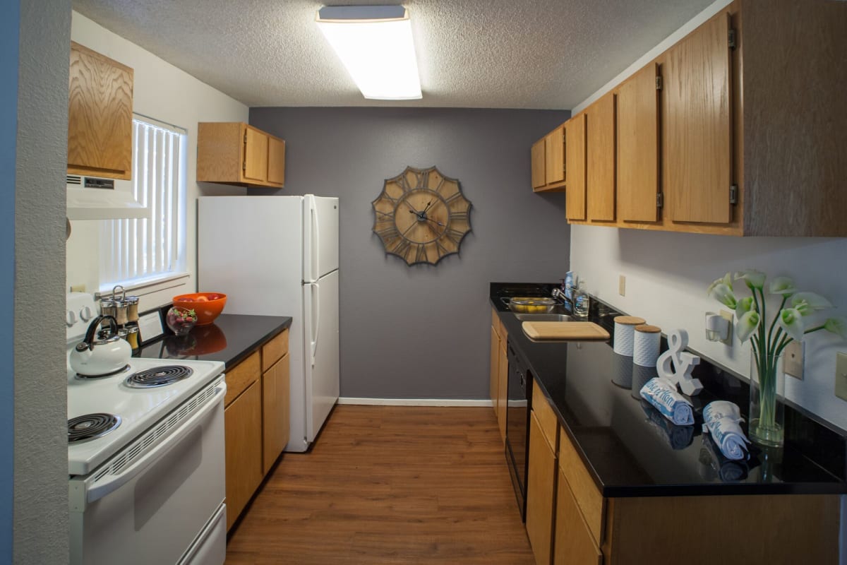 Fully equipped kitchen in a student apartment at Hawks Pointe in Lawrence, Kansas