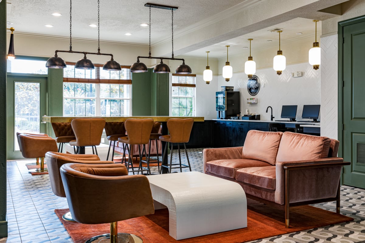 Leather sofa and chairs by the coffee bar at 4050 Lofts in Tampa, Florida