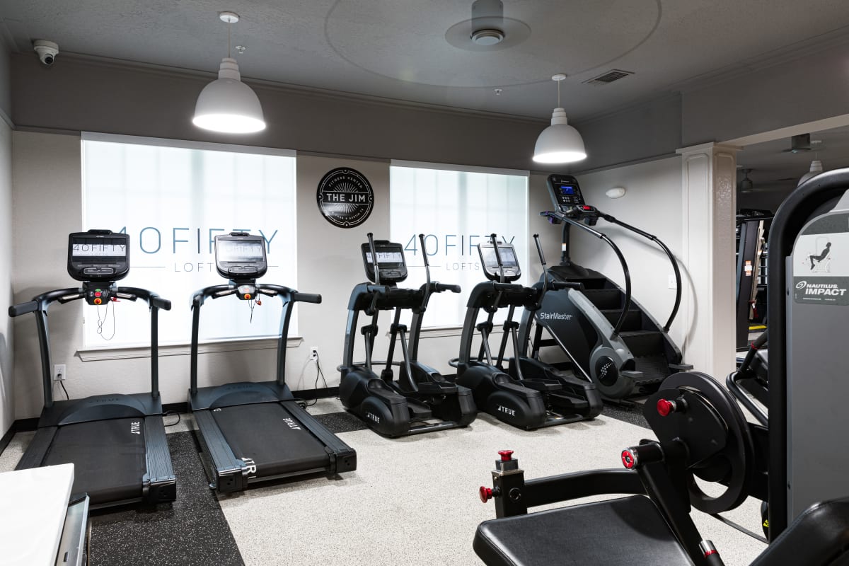 Fitness center with cardio equipment at 4050 Lofts in Tampa, Florida