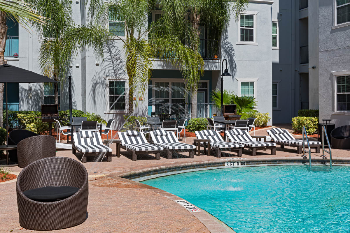 Lounge chairs by the pool at 4050 Lofts in Tampa, Florida