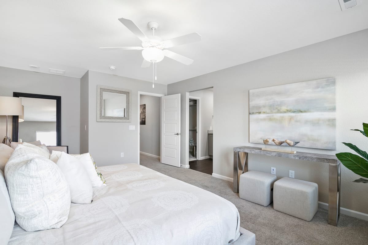 Large bedroom with a nice ceiling fan to keep you cool in your well lit room at BB Living at Murphy Creek in Aurora, Colorado