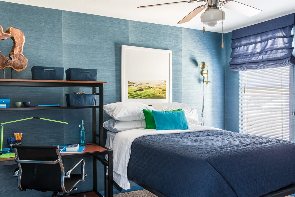 Bedroom with a ceiling fan at The Scarlet in Lubbock, Texas