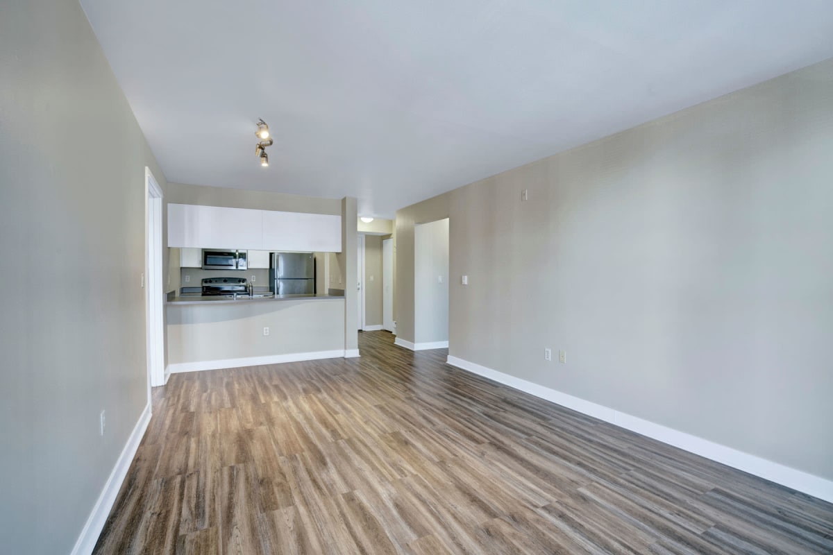 Beautifully finished hardwood floors in an open-concept apartment at Vantage Park Apartments in Seattle, Washington