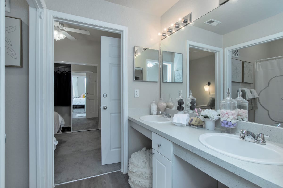 Large bathroom with tons of counter space and a huge mirror at The Ivy in Tampa, Florida