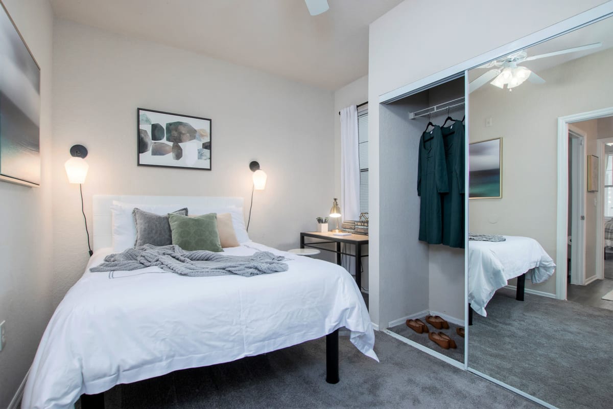 Large bedroom with extra closet space and carpeted floors at The Ivy in Tampa, Florida