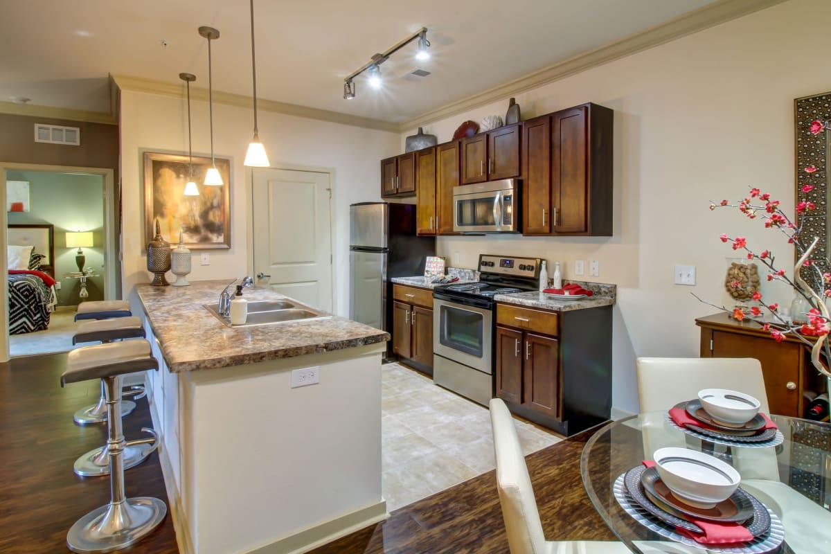 Kitchen with cabinet at Seagrass Apartments in Jacksonville, Florida