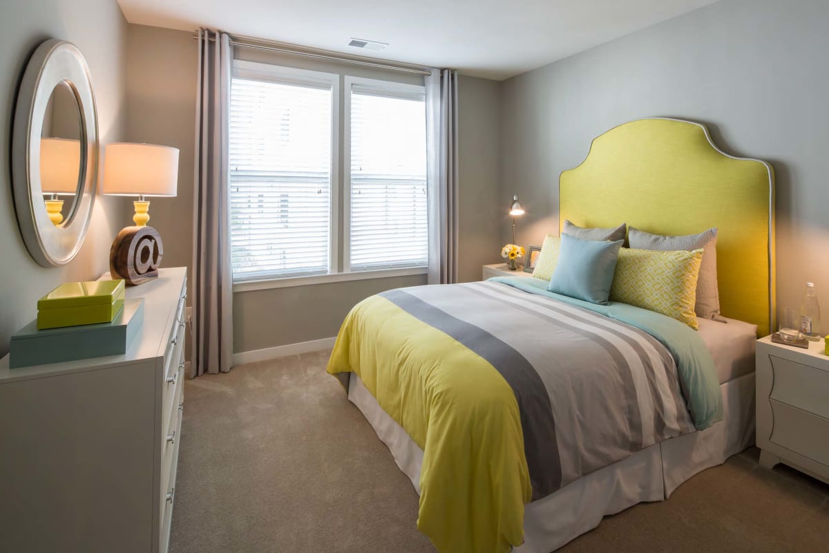 Cozy bedroom in a model home at The Tala at Washington Hill in Baltimore, Maryland