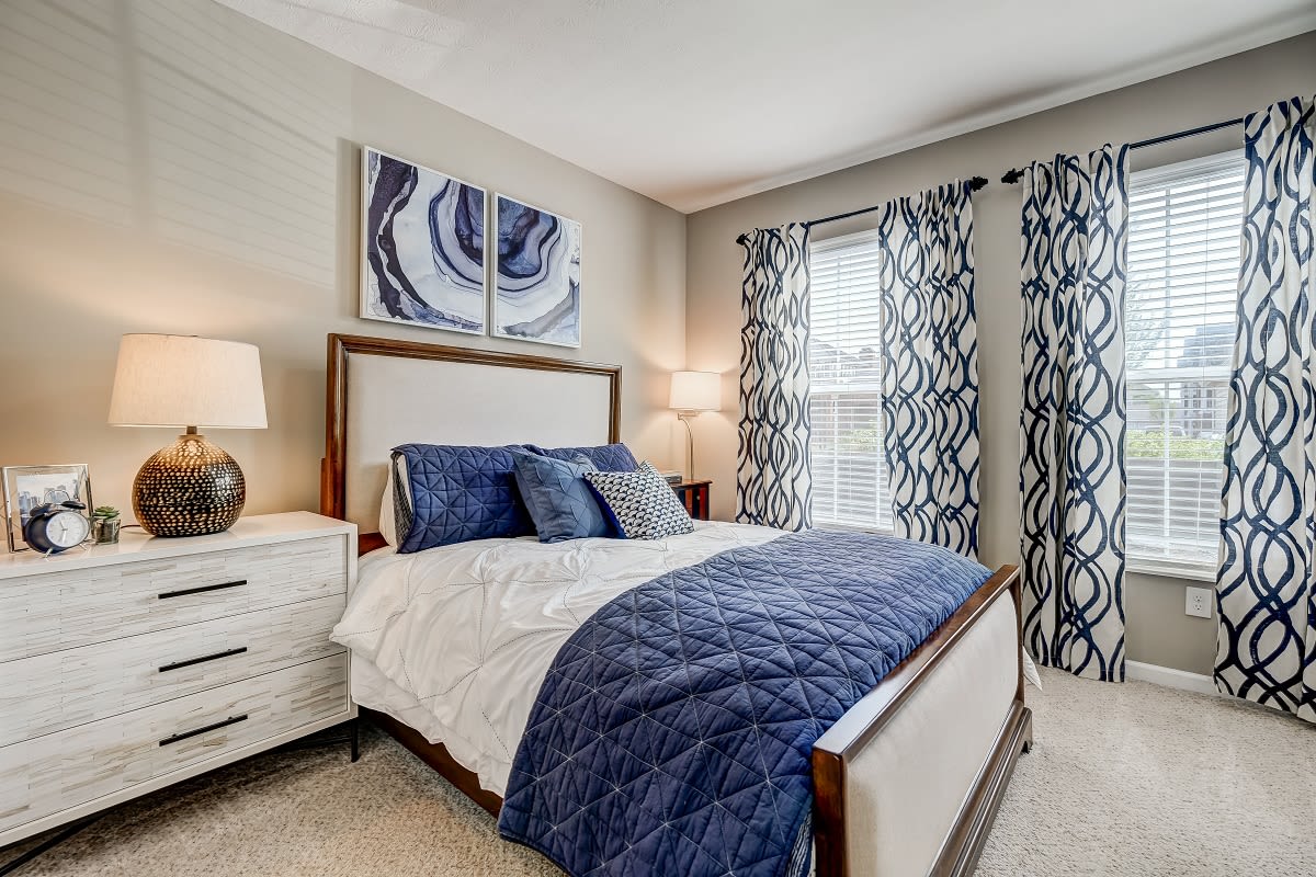 Spacious bedroom with large windows at Clifton Park Apartment Homes in New Albany, Ohio