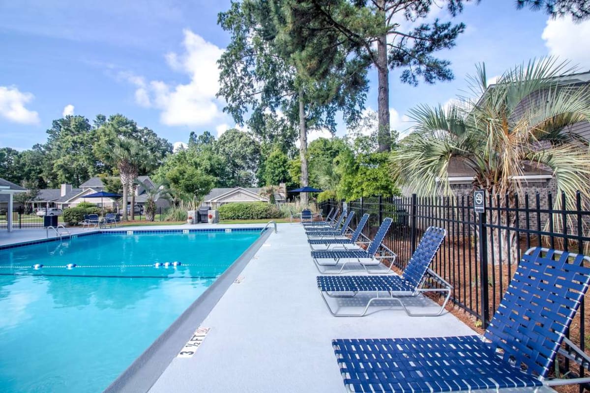 Poolside seating at Cottages at Crowfield in Ladson, South Carolina