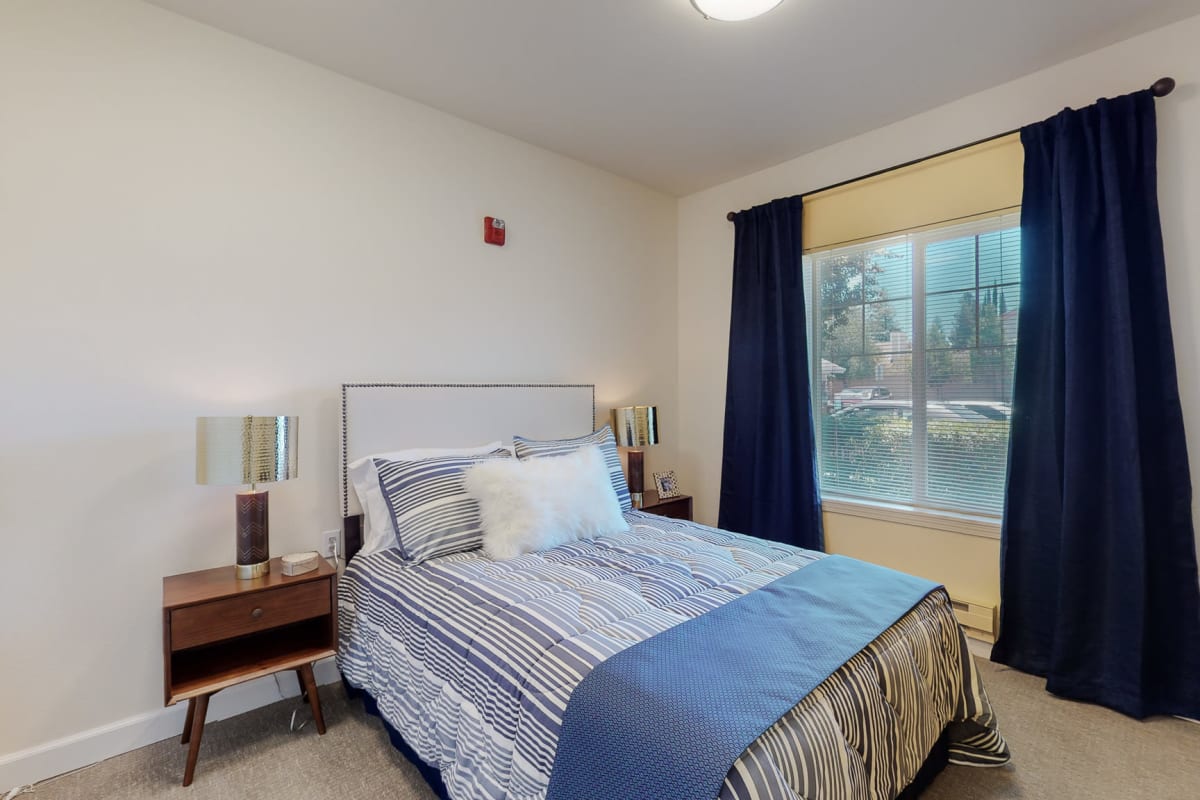 Senior living bedroom at The Commons at Dallas Ranch in Antioch, California