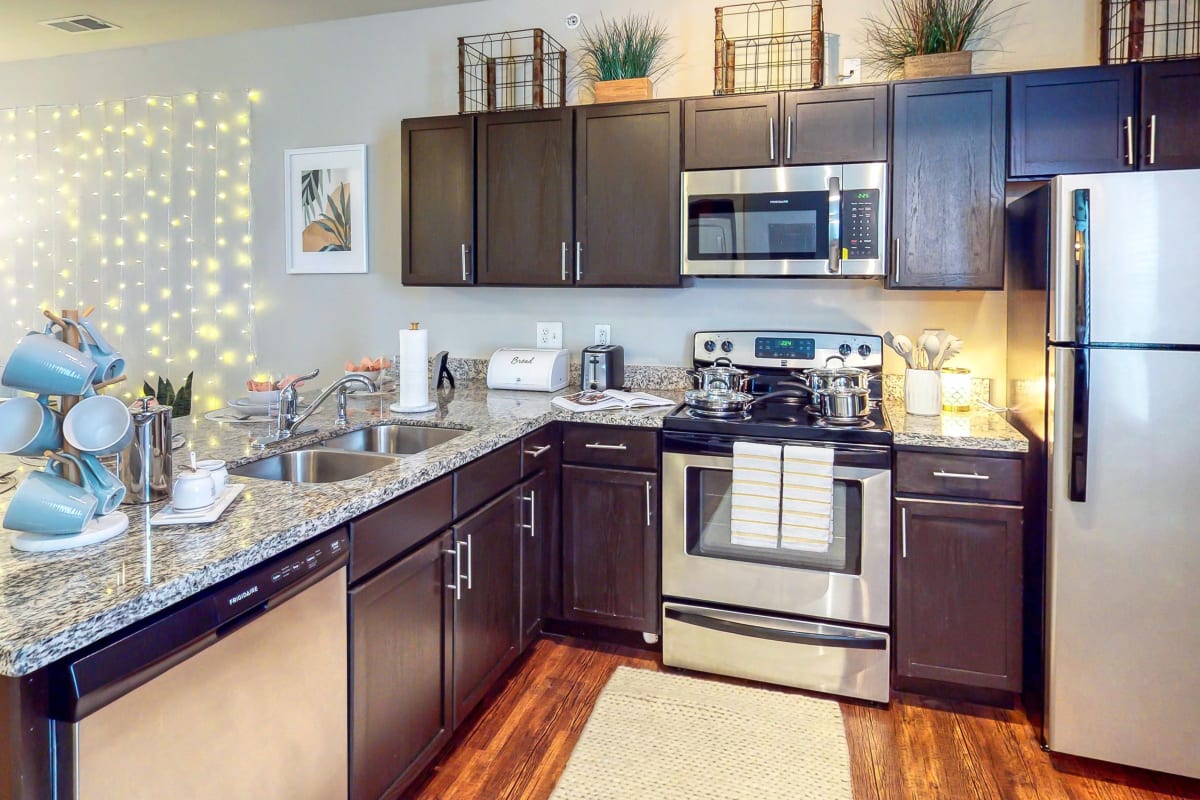 Model kitchen with granite countertops at The Dillon in Bloomington, Indiana