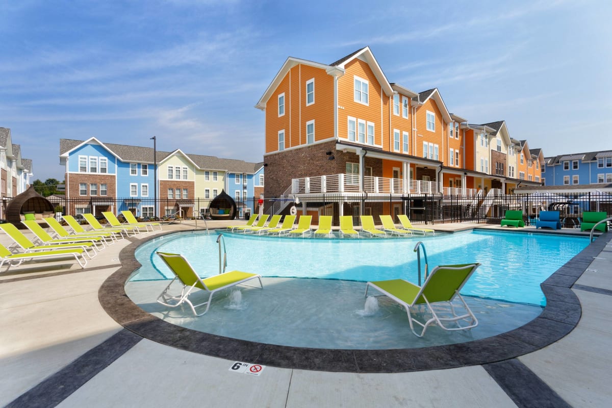 Swimming pool with lounge chairs at The Dillon in Bloomington, Indiana