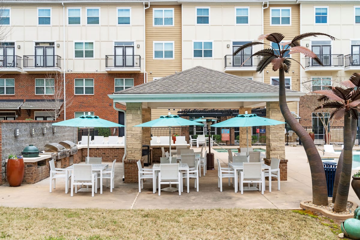 Picnic tables near the pool at The Blake in Kennesaw, Georgia