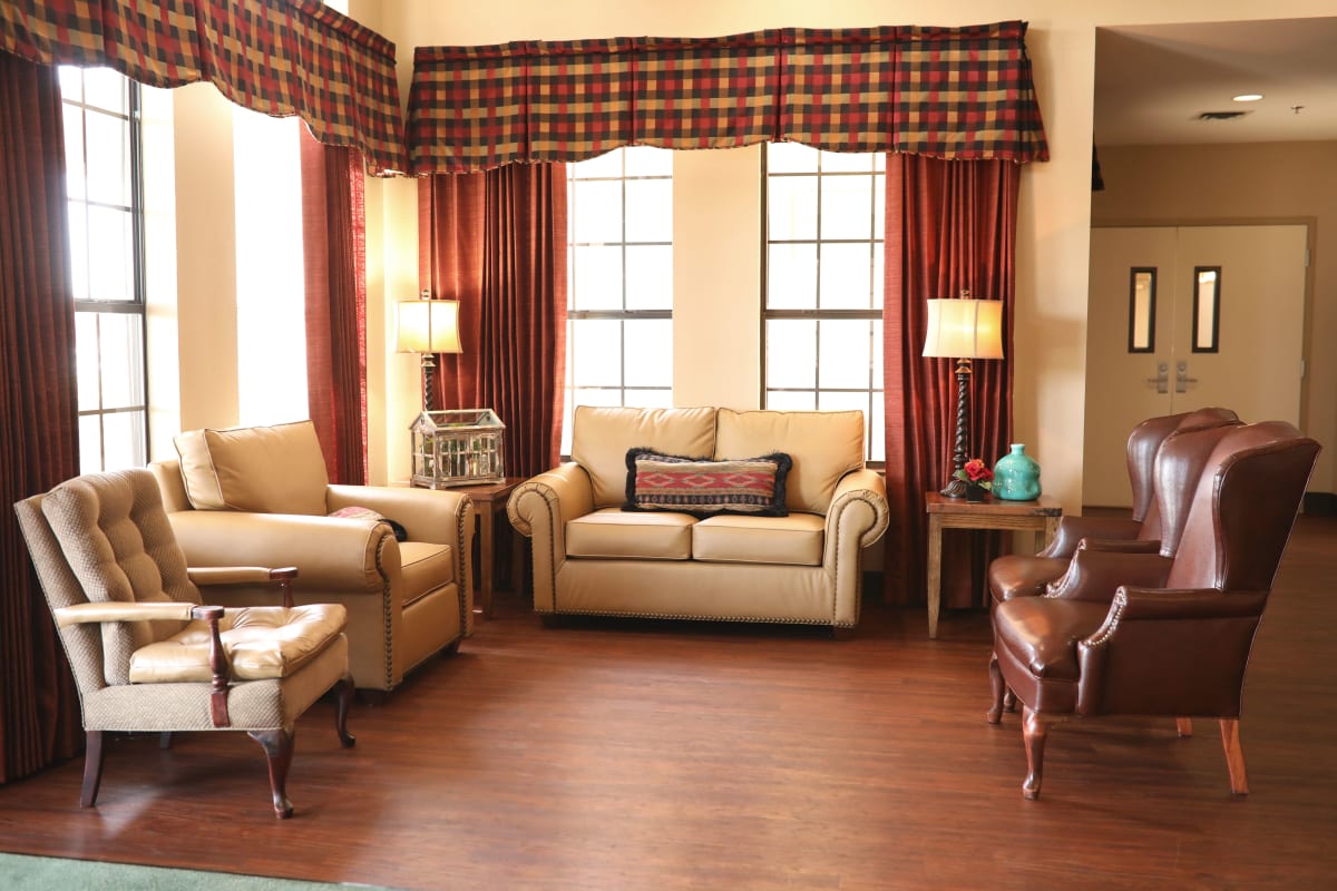 Living room area with a fireplace at Retirement Ranch in Clovis, New Mexico